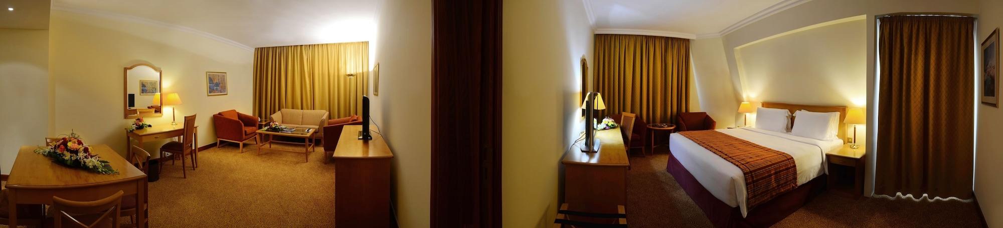 Swiss-Belhotel Schardscha Zimmer foto