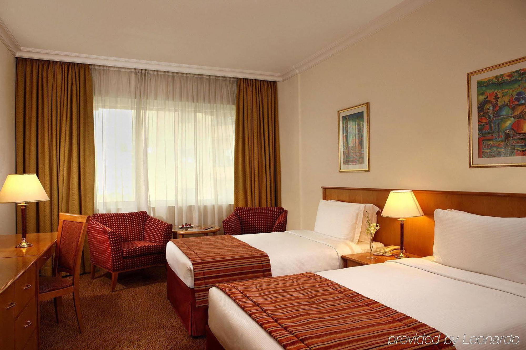 Swiss-Belhotel Schardscha Zimmer foto